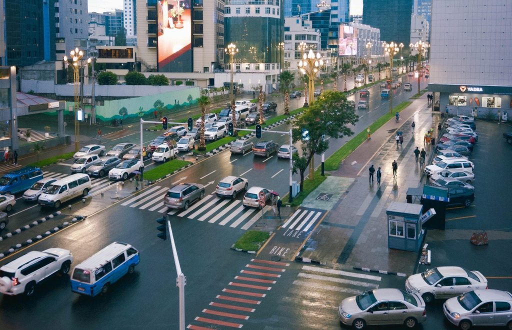 View of Addis Ababa's bustling streets and modern architecture on a rainy day.